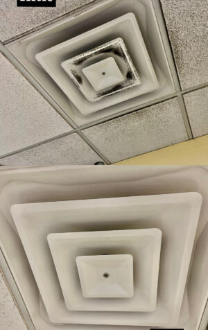 Dusty ceiling air vent in residential HVAC system