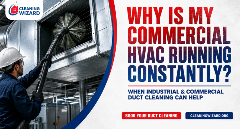 Commercial HVAC technician from Cleaning Wizard using professional air duct cleaning equipment on large industrial ventilation ducts