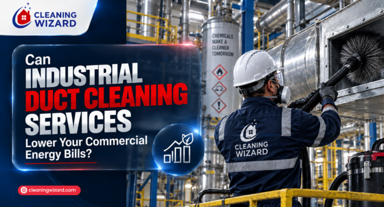 A Cleaning Wizard technician using a rotary brush to clean an industrial ventilation duct to help lower commercial energy bills.